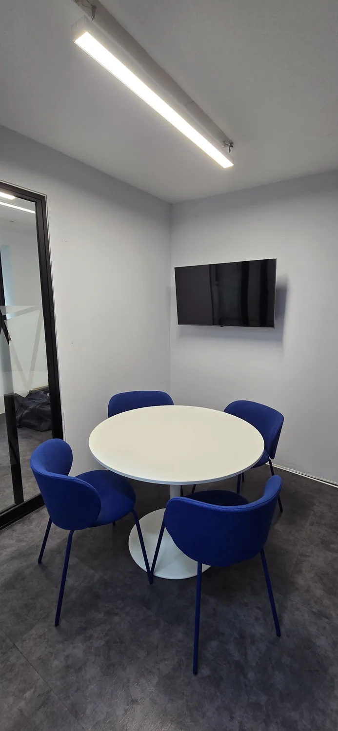 Private meeting room with a round table.